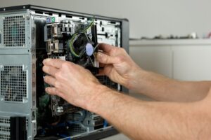technician is installing motherboard desktop case 191163 1990