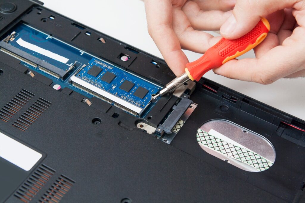 using screwdriver master dismantles laptop case into parts replacement repair parts laptop repair 150893 8 using screwdriver master dismantles laptop case into parts replacement repair parts laptop repair 150893 8