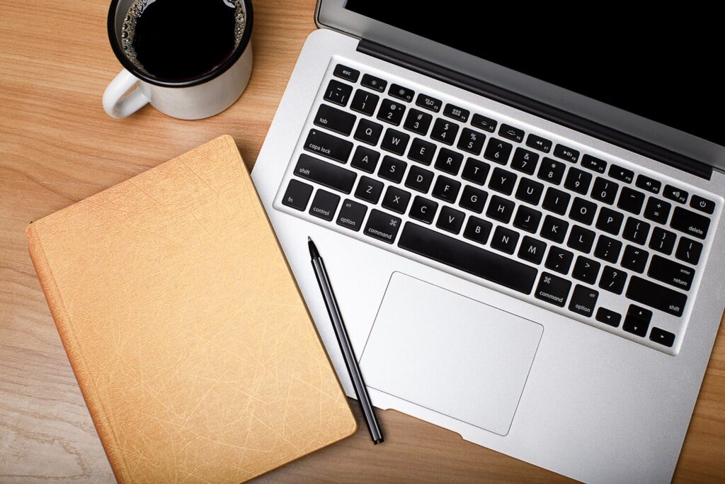 laptop with cup coffee notebook wooden table top view 248437 88 laptop with cup coffee notebook wooden table top view 248437 88